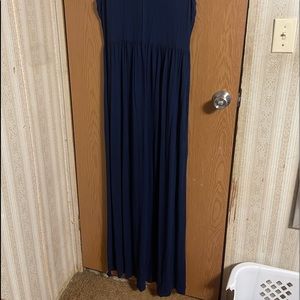 Woman’s floor length navy blue dress